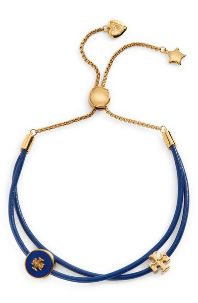 Shop Tory Burch Kira Slider Bracelet In Tory Gold / Nautical Blue