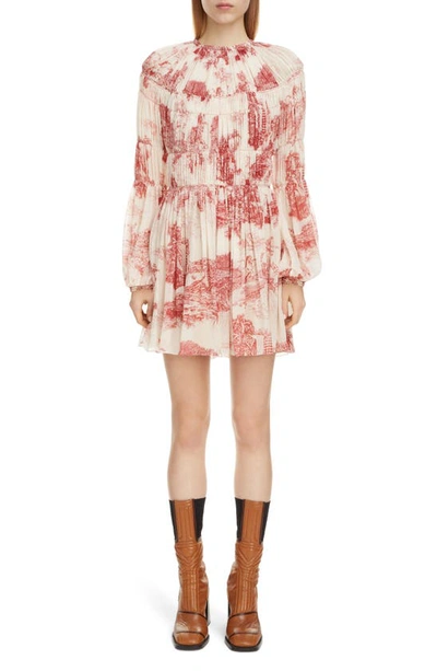 Shop Chloé Toile Long Sleeve Smocked Silk Georgette Minidress In White - Red 1