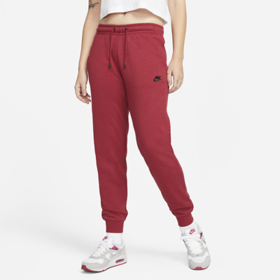 Shop Nike Sportswear Essential Women's Fleece Pants In Pomegranate,black