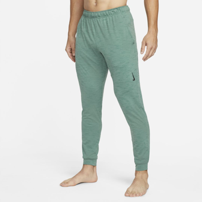 Shop Nike Yoga Dri-fit Men's Pants In Jade Smoke,bicoastal