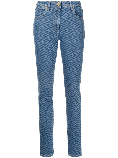 Shop Versace Greca-print Skinny Jeans In Blue