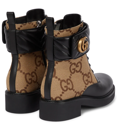 GUCCI DOUBLE G LEATHER-TRIMMED LACE-UP BOOTS P00613282