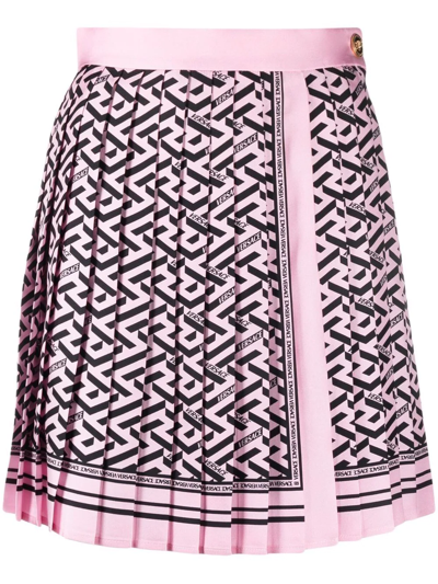 Shop Versace La Greca Print Pleated Miniskirt In Pink