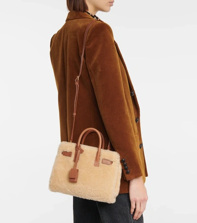 Shop Saint Laurent Sac De Jour Nano Shearling And Leather Shoulder Bag In Natural Beige/brick