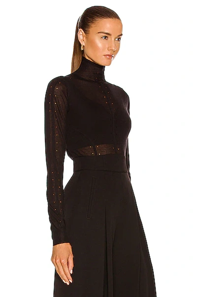 Shop Alaïa Long Sleeve Roll Neck Sweater In Noir