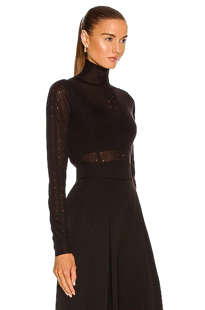 Alaïa Long Sleeve Roll Neck Sweater In Noir