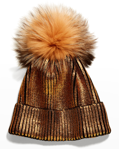 Shop Adrienne Landau Metallic Ribbed Beanie W/ Fox Fur Pompom In Gold
