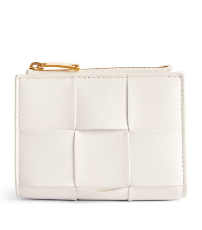Shop Bottega Veneta Leather Intrecciato Bifold Wallet In White