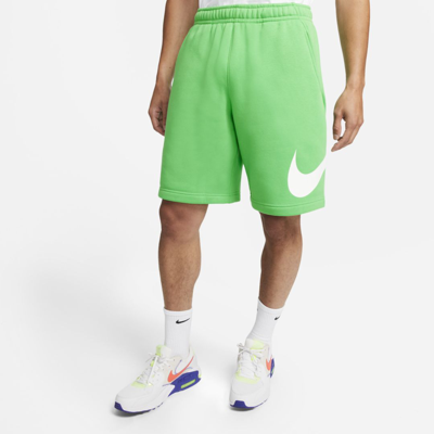 Shop Nike Sportswear Club Men's Graphic Shorts In Light Green Spark,light Green Spark