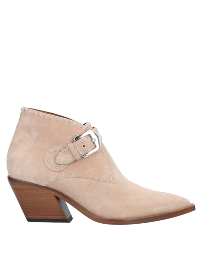 Shop Givenchy Ankle Boots In Sand