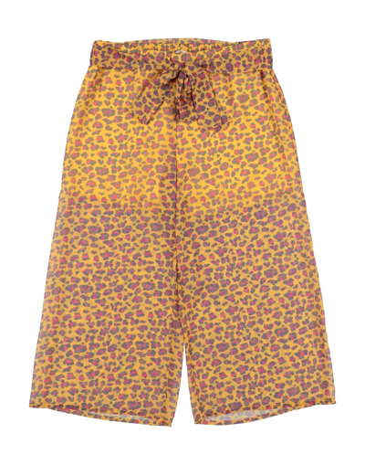 Shop Vicolo Pants In Yellow