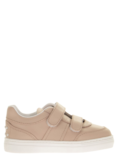 Shop Tod's Trainers With Strap Closure In Pink