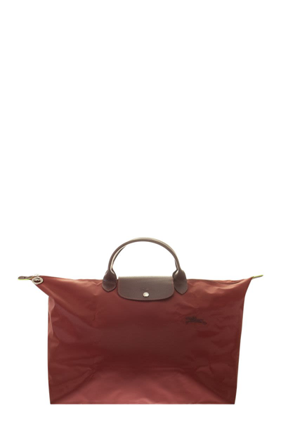 Shop Longchamp Le Pliage Green - Travel Bag L In Red