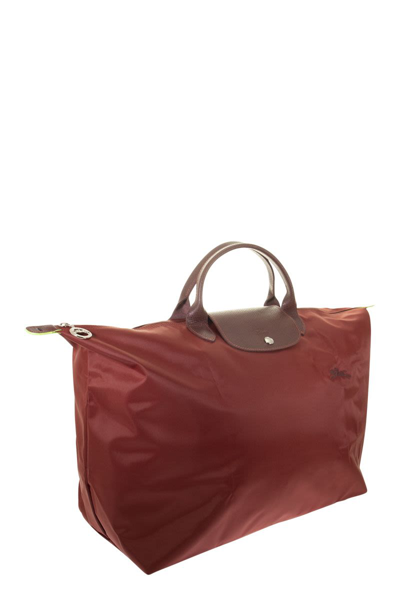 Shop Longchamp Le Pliage Green - Travel Bag L In Red