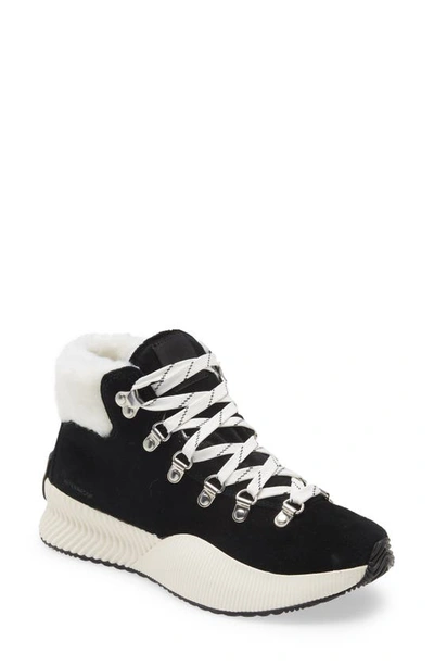 Shop Sorel Out N' About Iii Conquest Waterproof Boot In Black Sea Salt