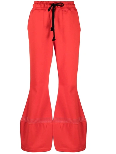 Shop Jw Anderson Red Flared Sports Trousers