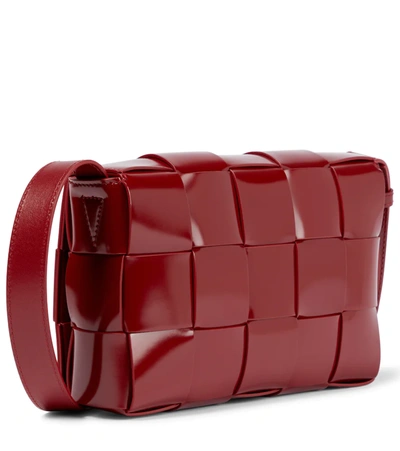 Shop Bottega Veneta Cassette Patent Leather Shoulder Bag In Dark Red-gold