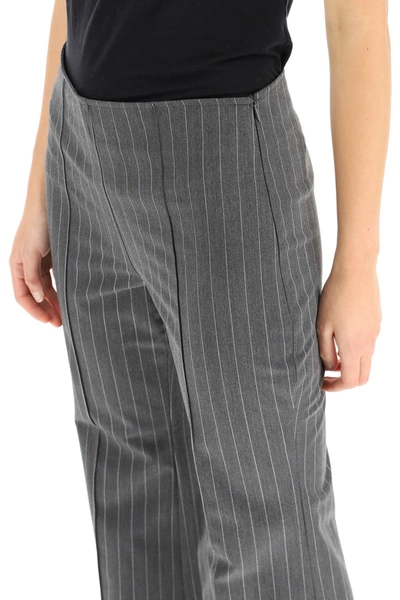 Shop Ganni Kick-flare Cropped Trousers In Grey,white