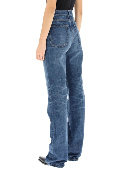 Shop Saint Laurent High Rise Flared Jeans In Blue