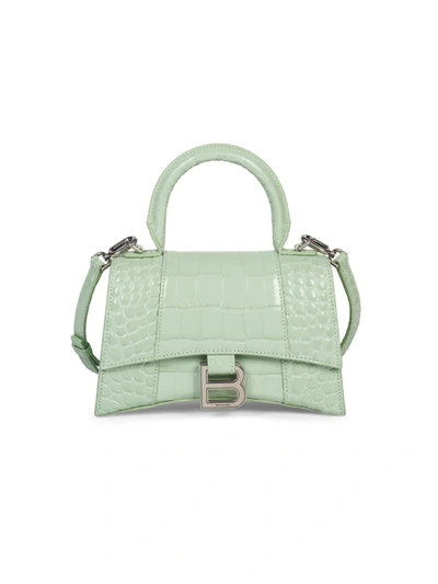 Shop Balenciaga Xs Hourglass Croc-embossed Leather Top Handle Bag In Light Green
