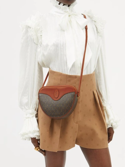 Brown Le Monogramme coated-canvas cross-body bag, Saint Laurent