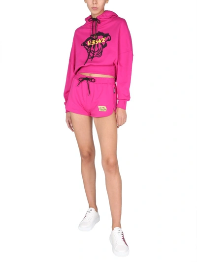 Shop Versace Sweatshirt With Smile Medusa Motif In Fuchsia