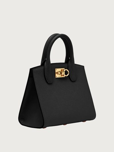 Ferragamo Gilded Hardware Tote With Handle And Metal Feet In Black