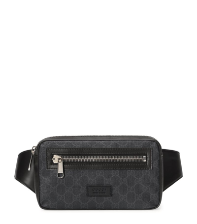 Shop Gucci Leather Gg Supreme Belt Bag In Black