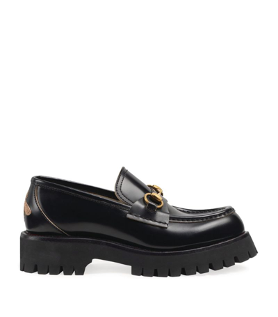 Shop Gucci Leather Lug Sole Horsebit Loafers In Black