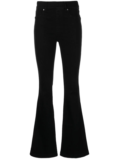 Shop Spanx High-rise Flared Jeans In Black