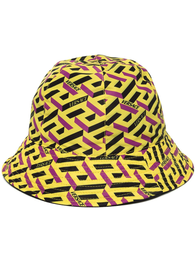 Shop Versace Monogram Print Bucket Hat In Yellow
