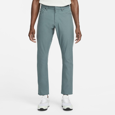 Shop Nike Dri-fit Repel Men's 5-pocket Slim Fit Golf Pants In Hasta