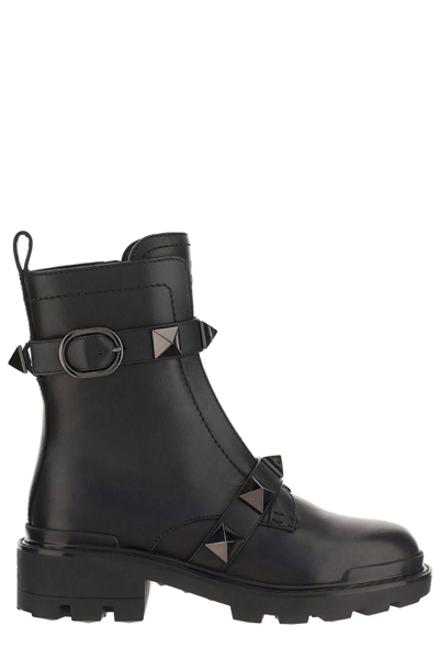 Shop Valentino Garavani Buckle Detailed Combat Boot In Black