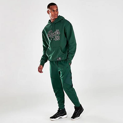 Shop Nike Jordan Men's Dri-fit Air Pants In Noble Green/noble Green/black
