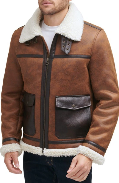 Shop Levi's Faux Shearling Moto Jacket In Brown
