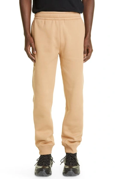 Shop Burberry Check Panel Cotton Blend Joggers In Camel