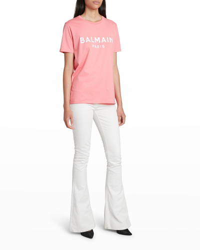 Shop Balmain Monogram Embroidered Bootcut Jeans In White