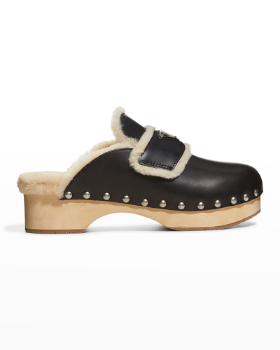 Shop Prada Leather Shearling Logo Mule Clogs In Black/brown