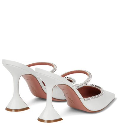 Shop Amina Muaddi Gilda Embellished Leather Mules In White