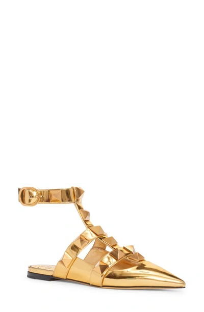 Shop Valentino Roman Stud Ankle Strap Pointed Toe Flat In Brass