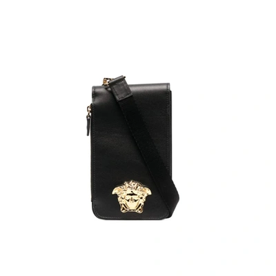 Shop Versace Logo Crossbody Bag In Black
