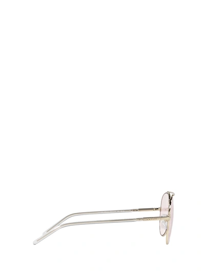 Shop Prada Eyewear Sunglasses In Pale Gold