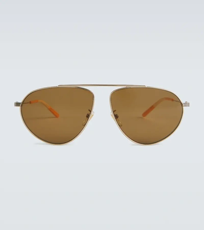 Shop Gucci Metal Frame Aviator Sunglasses In Gold-gold-brown