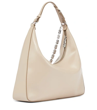 Shop Givenchy Moon Cut Out Medium Leather Shoulder Bag In Dune