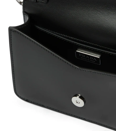 Prada Mini Leather Crossbody Bag In Black