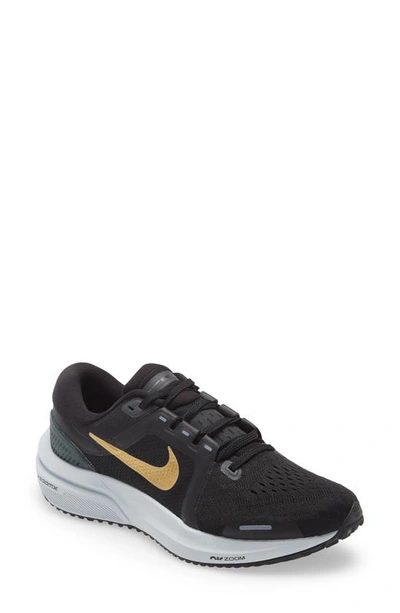 Shop Nike Air Zoom Vomero 16 Sneaker In Black/ Gold Coin