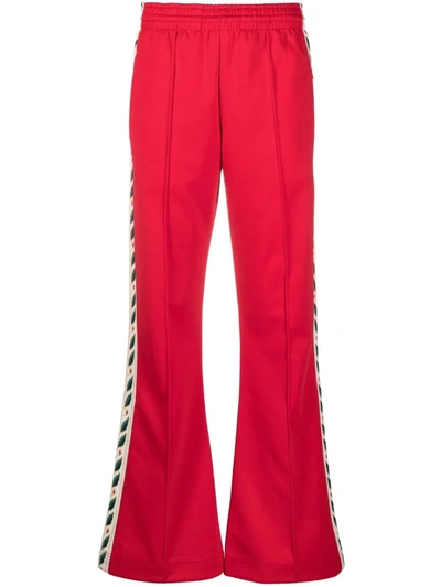 Shop Casablanca Floral-embroidered Flared Trousers In Red