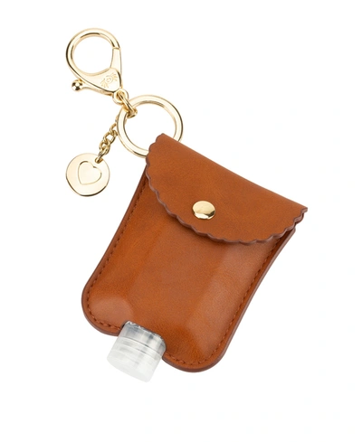 Shop Itzy Ritzy Cute And Clean Hand Sanitizer Clip Charm In Cognac