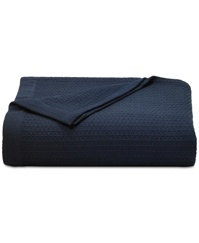 Shop Nautica Baird Solid Cotton Dobby Reversible Blanket, Full/queen In Navy