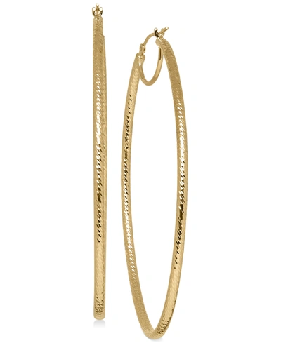 Shop Italian Gold Oval Hoop Earrings In 14k Gold In Yellow Gold